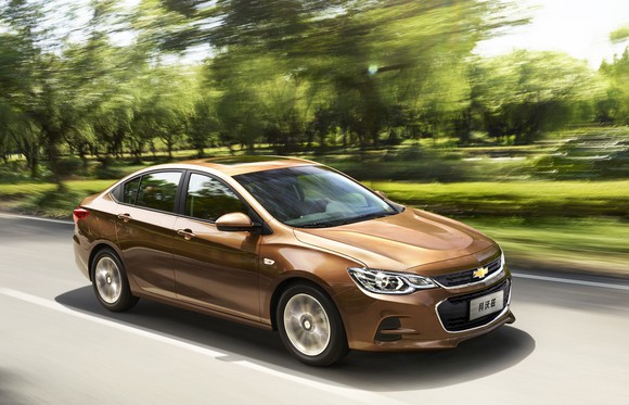 A brown Chevrolet Cavalier, a compact sedan sold in China. 