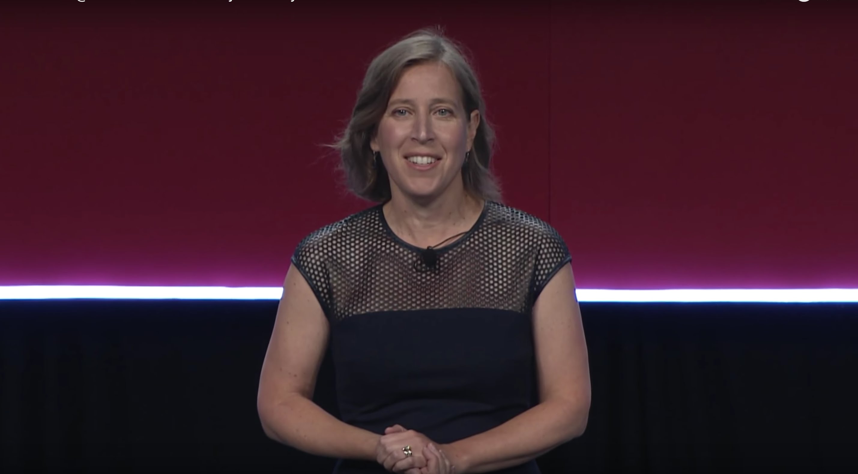YouTube CEO Susan Wojcicki speaking on a stage