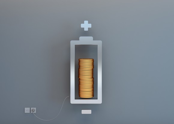 A battery with a stack of coins representing the charge level.