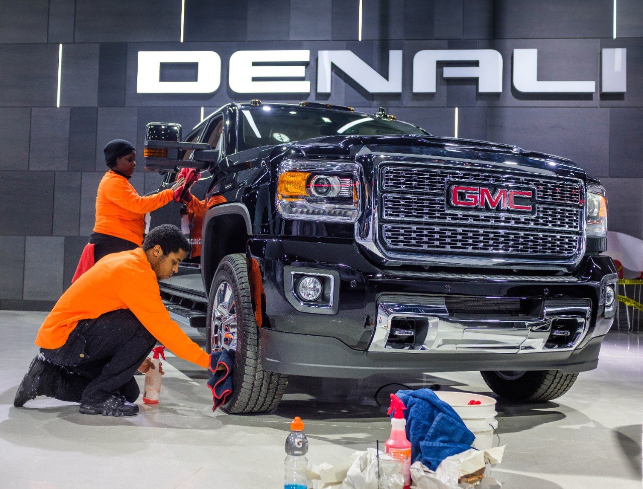A GMC truck being detailed for a show.