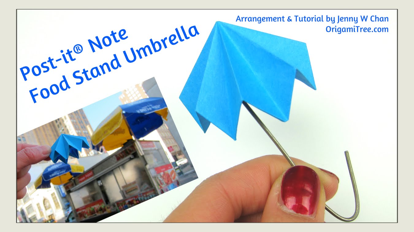 Origami Post-it Note art with a paper clip.