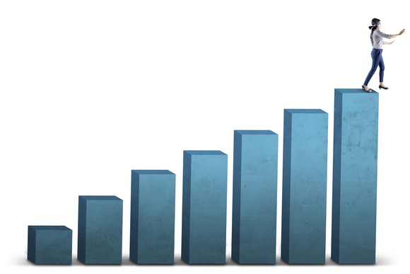 Blind businesswoman walks on financial chart