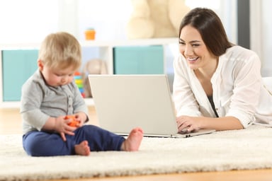 AG mother with baby and laptop