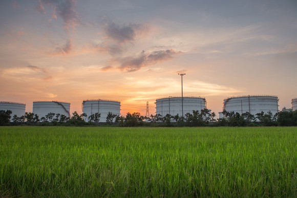 Oil tanks in a field