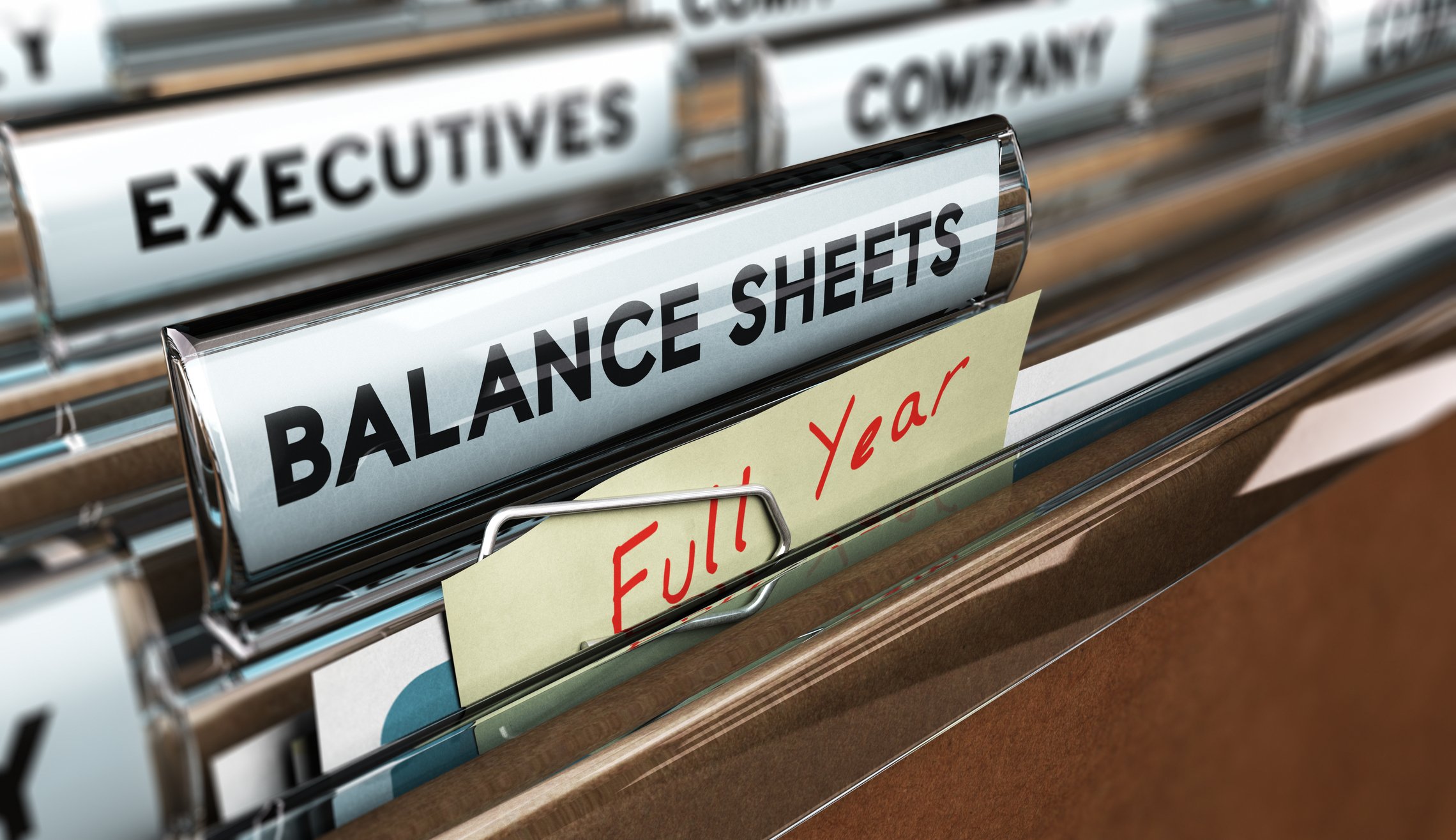 Folders in a filing cabinet, marked with labels such as Full Year, Balance Sheet, Company, and Executives.