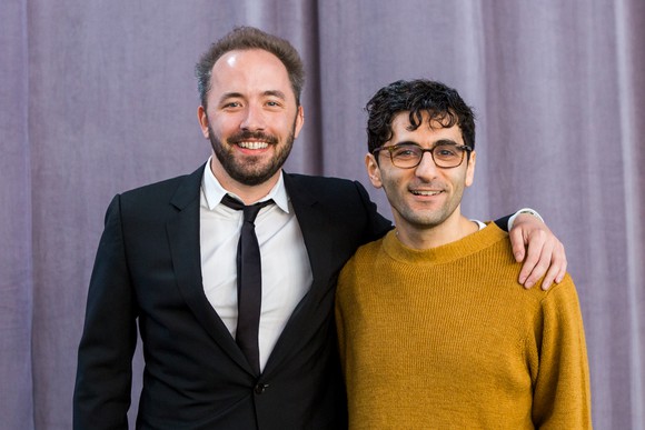 Drew Houston and Arash Ferdowsi standing together