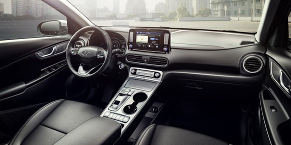 The dashboard and front seats of the Hyundai Kona Electric.