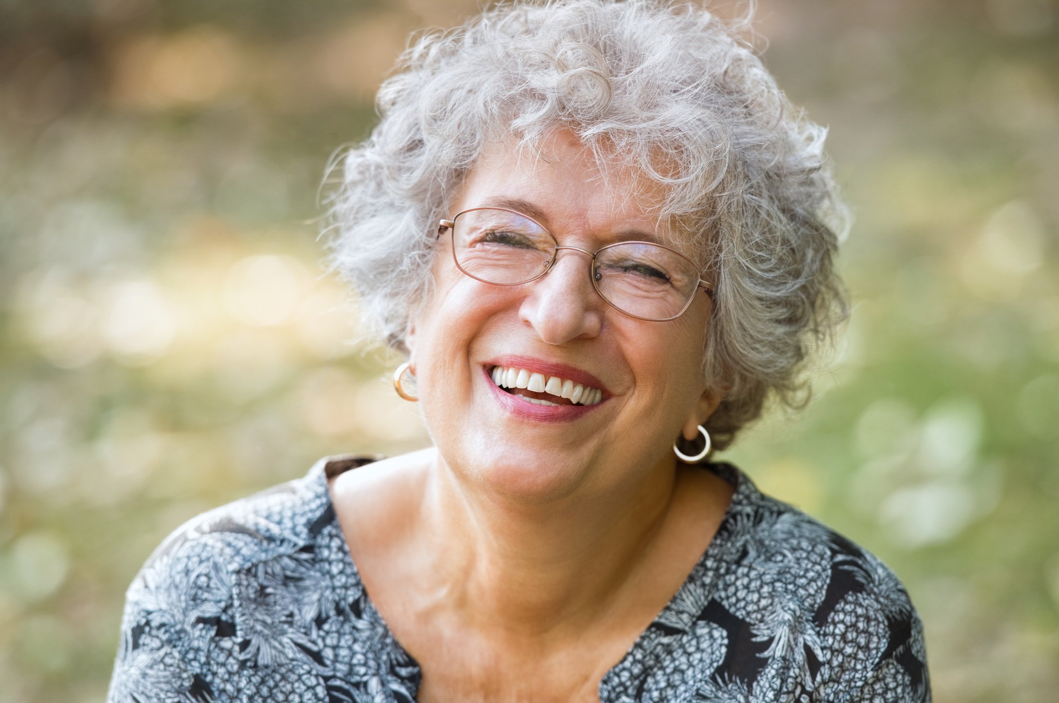 Smiling senior woman wearing glasses