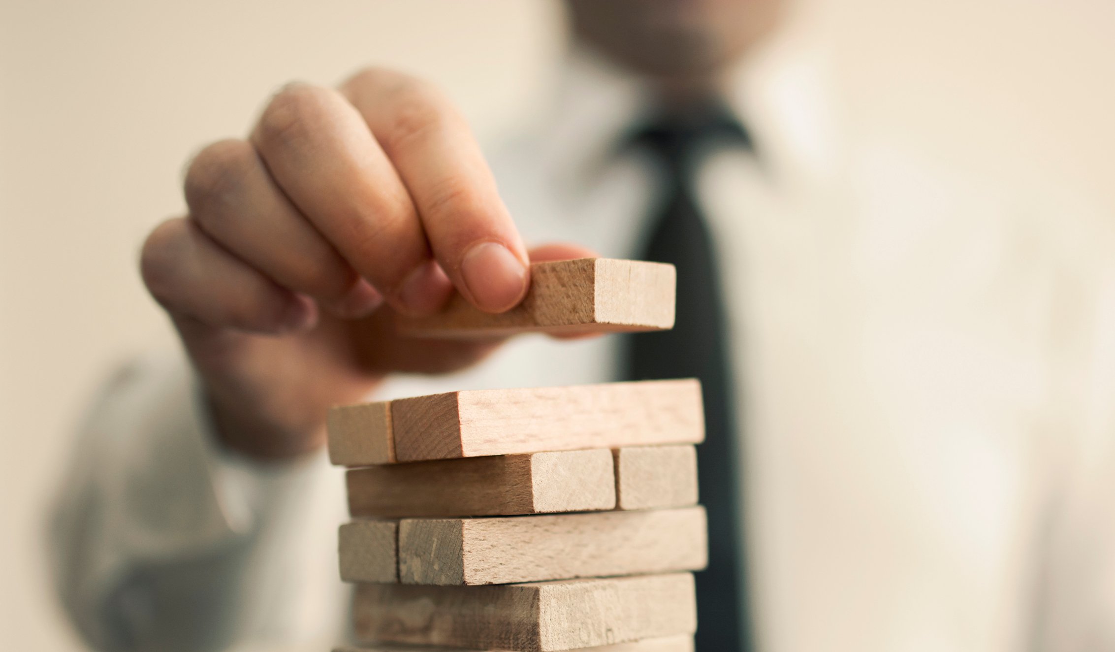 A man building blocks