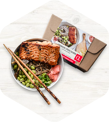 Sample meal kit of grilled salmon and endamame.
