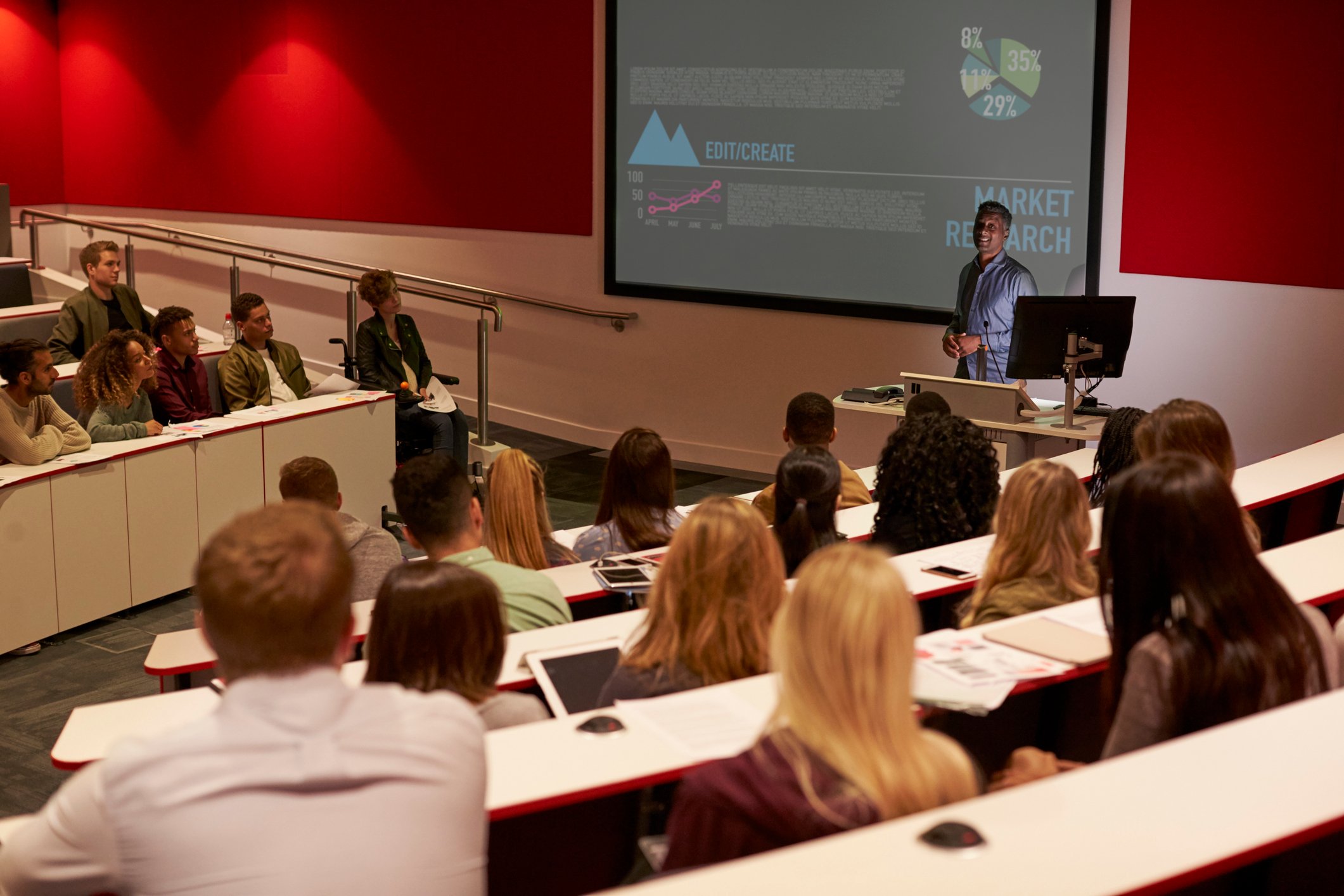 College students in rows at a lecture hall