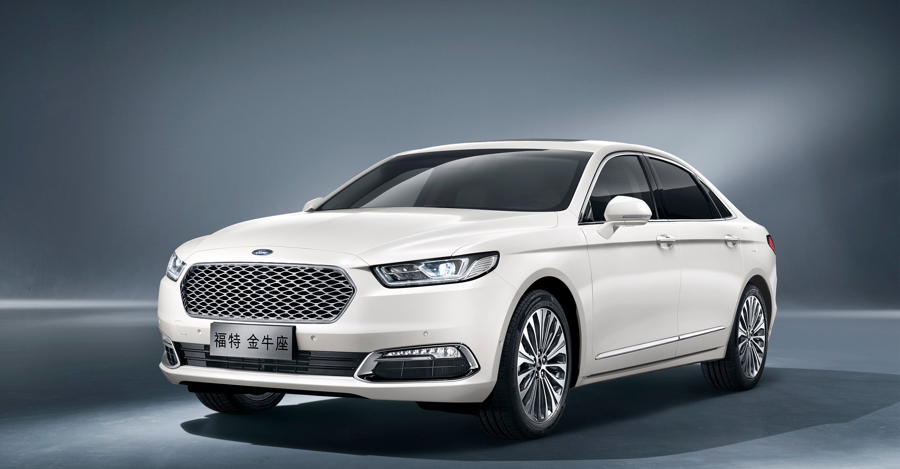 A Chinese-market Ford Taurus sedan in white. 