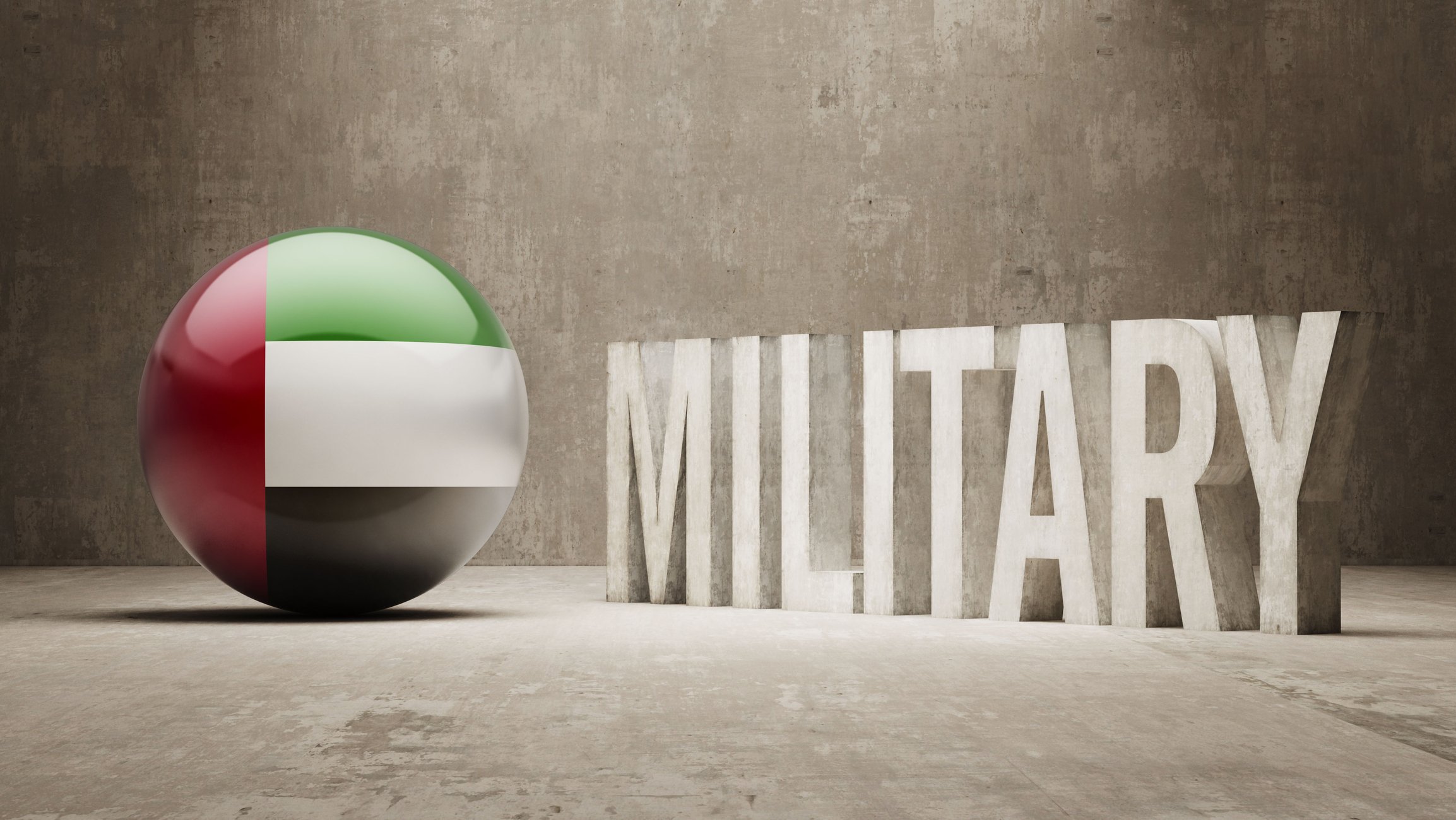 UAE flag printed on a ball next to word military