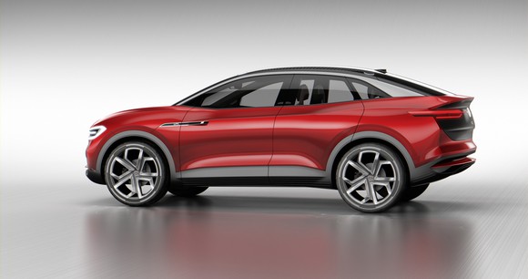 The Volkswagen I.D. Crozz II Concept, a red crossover SUV with a curved roof. 