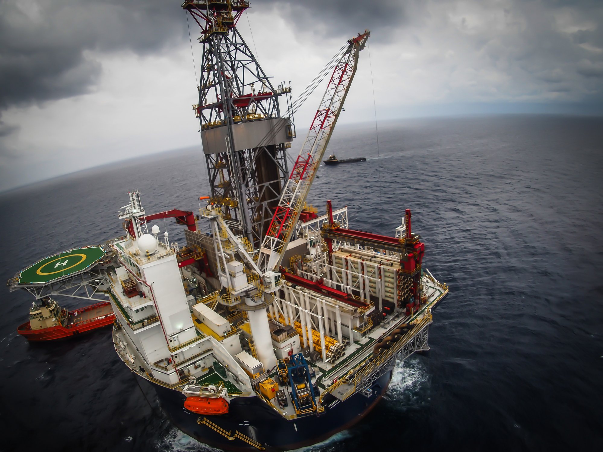 Overhead shot of oil platform in the ocean.