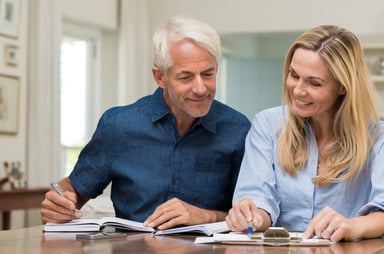 couple reviewing bills_GettyImages-531414568