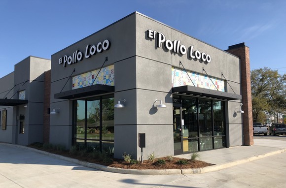Slate grey exterior of El Pollo Loco free-standing restaurant.