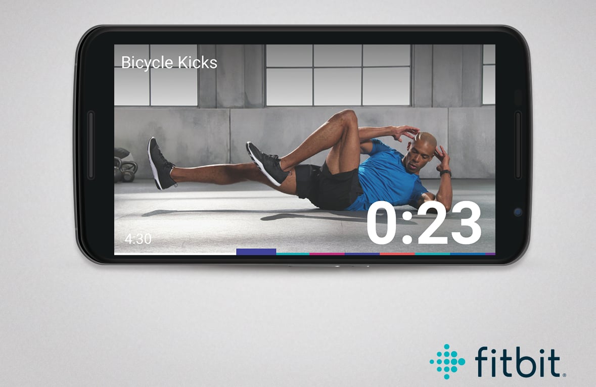 Mobile phone screen with bicycle kick exercise being demonstrated with a countdown timer shown.