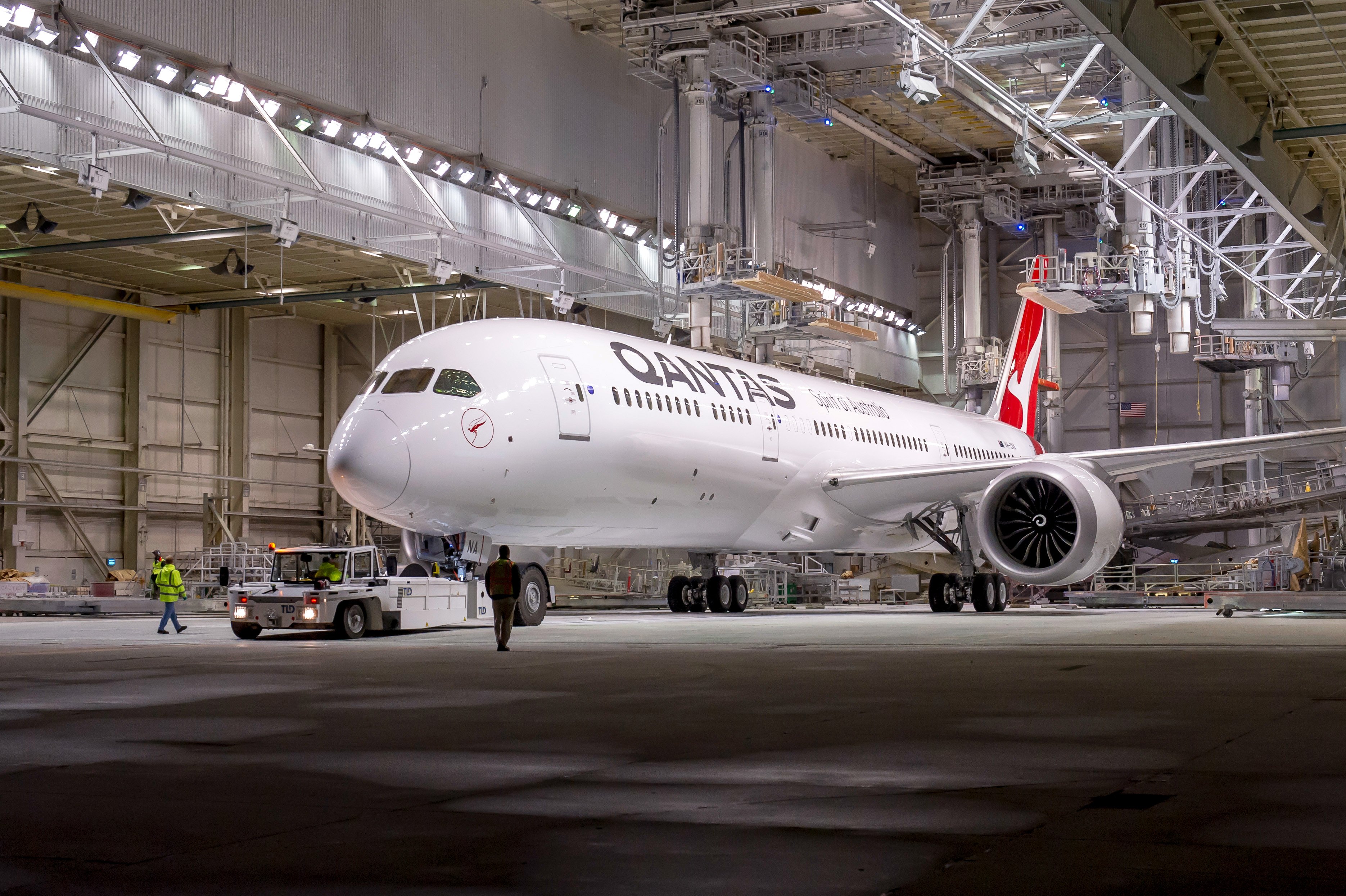 A Qantas 787-9 Dreamliner parked in a hangar