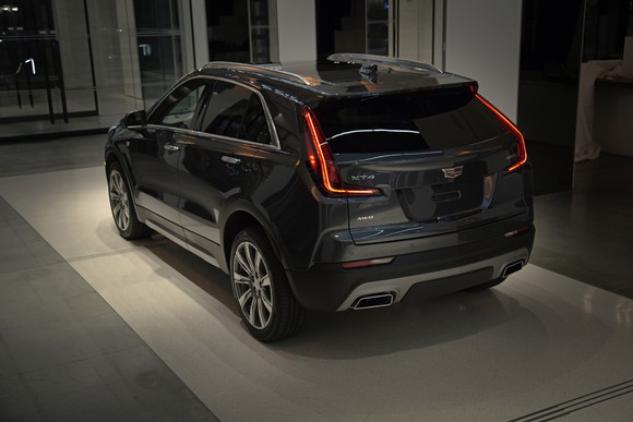 A dark gray 2019 Cadillac XT4 in Premium Luxury trim, shown at Cadillac House in New York. 