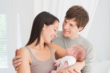 couple with newborn baby_GettyImages-104821552