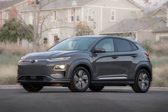 A gray 2019 Hyundai Kona Electric, a compact crossover SUV.