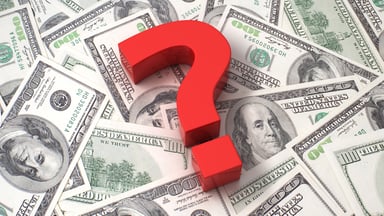 Question mark on top of money