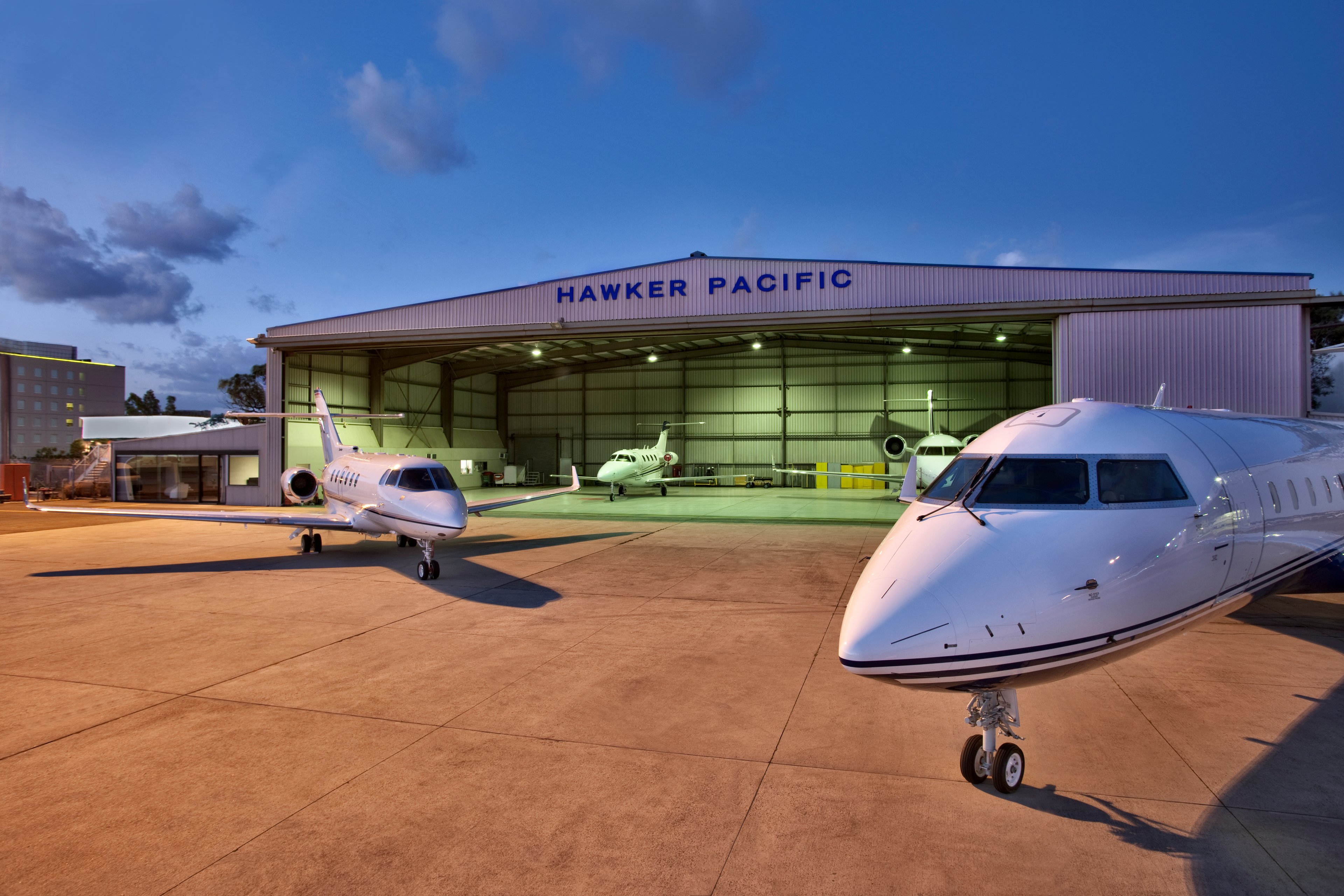 Hawker Pacific hanger, with airplanes in front.