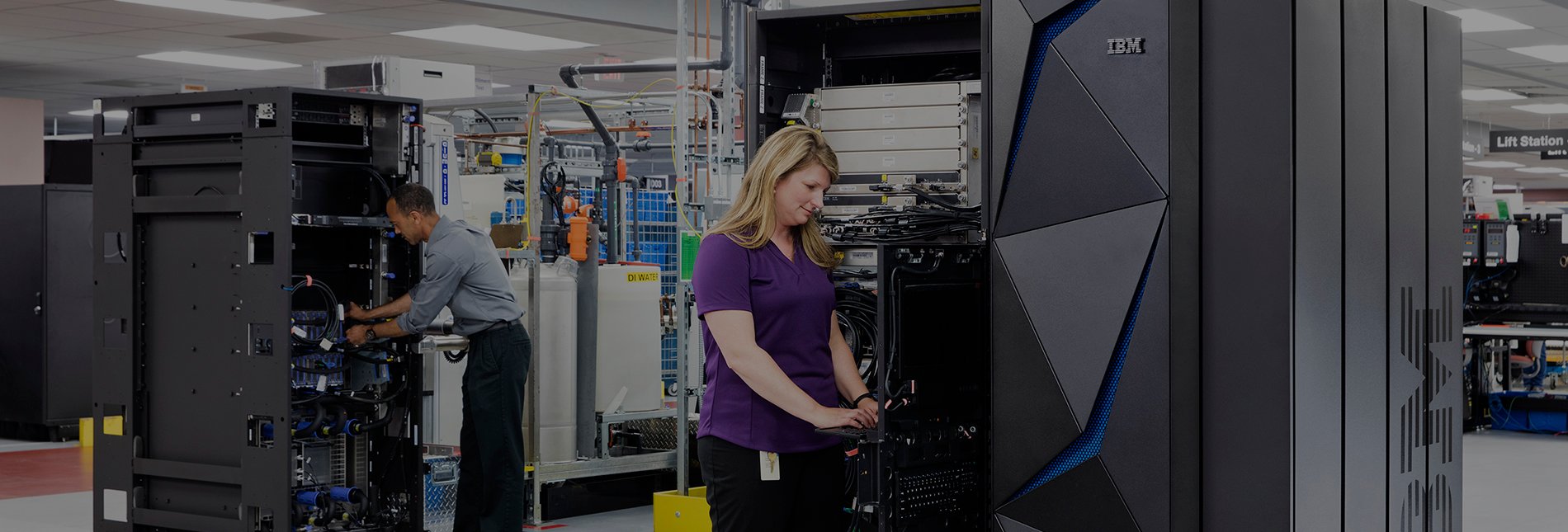 Woman working at an IBM Z mainframe. 