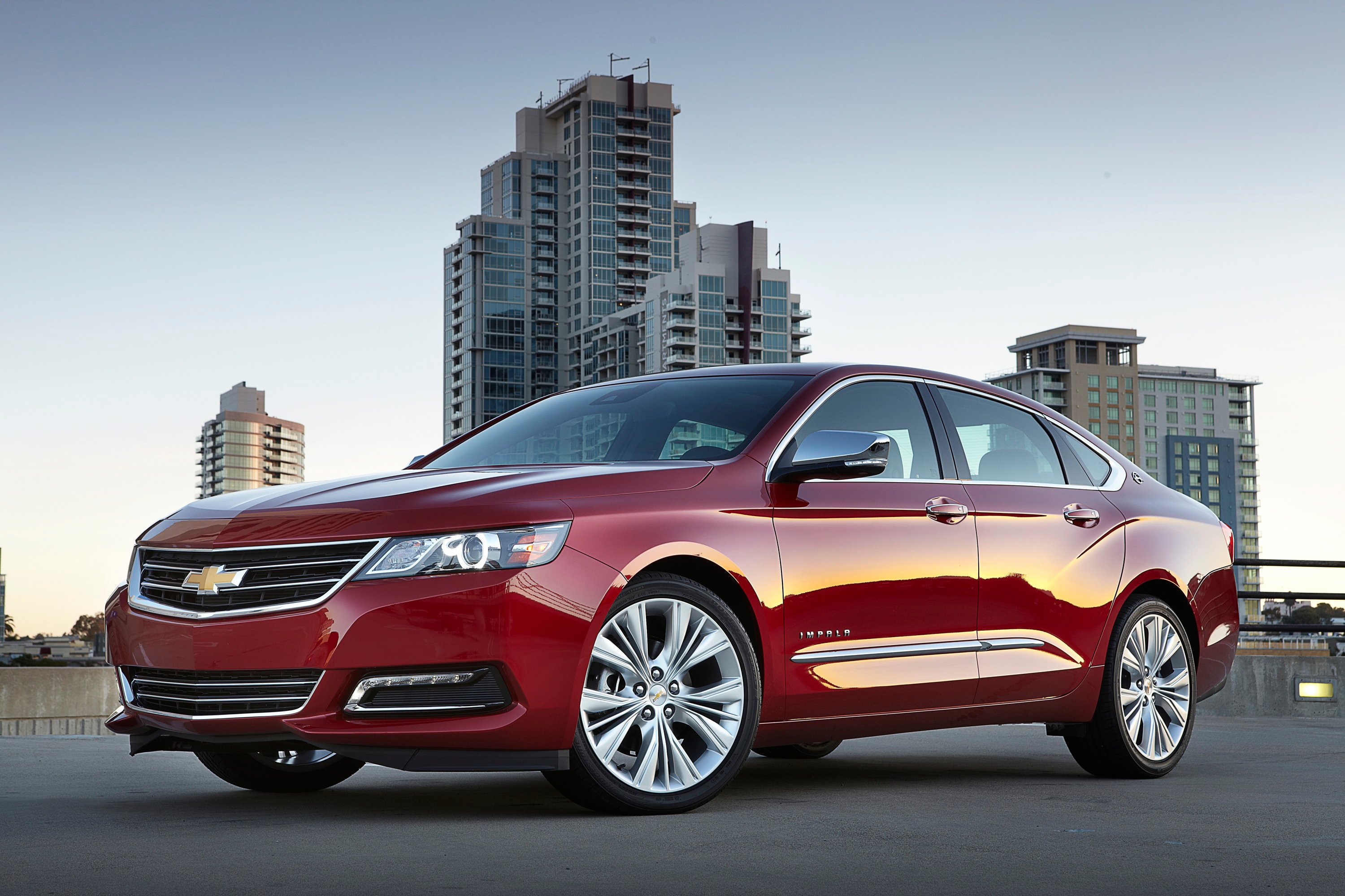 A red 2018 Chevrolet Impala, a full-size sedan.