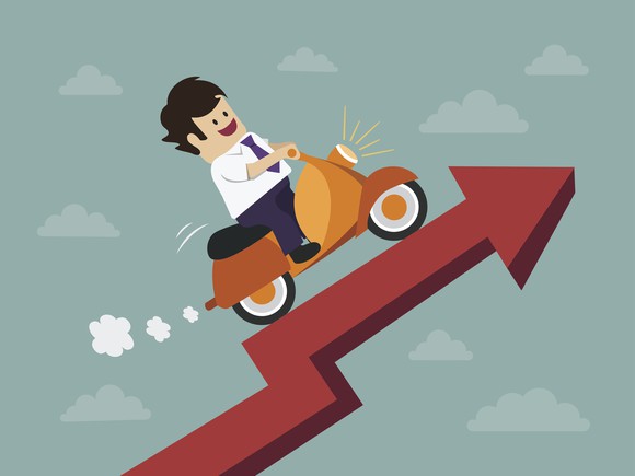 A cartoon person riding a scooter up a red arrow.