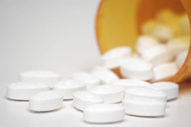 Drugs Coming From Pill Bottle