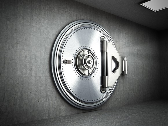 Round, secure steel bank vault door.