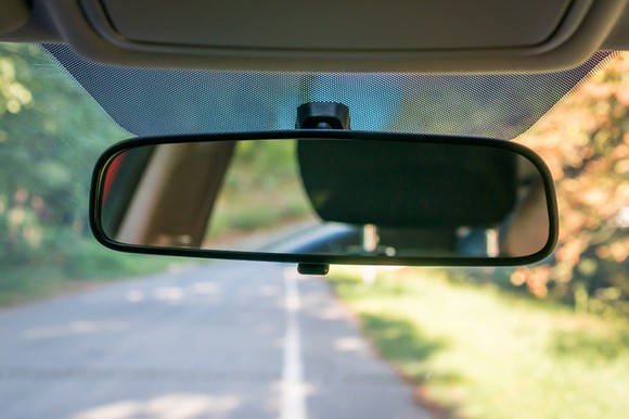 A car's rearview mirror.