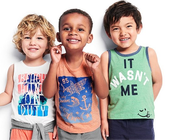 Three children wearing Osh Kosh B'Gosh closthing