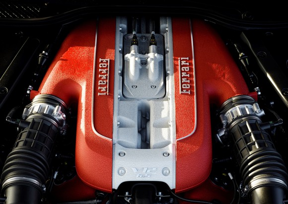 A look under the hood of an 812 Superfast, showing the shop of the car's 6.5 liter V12 gasoline engine.