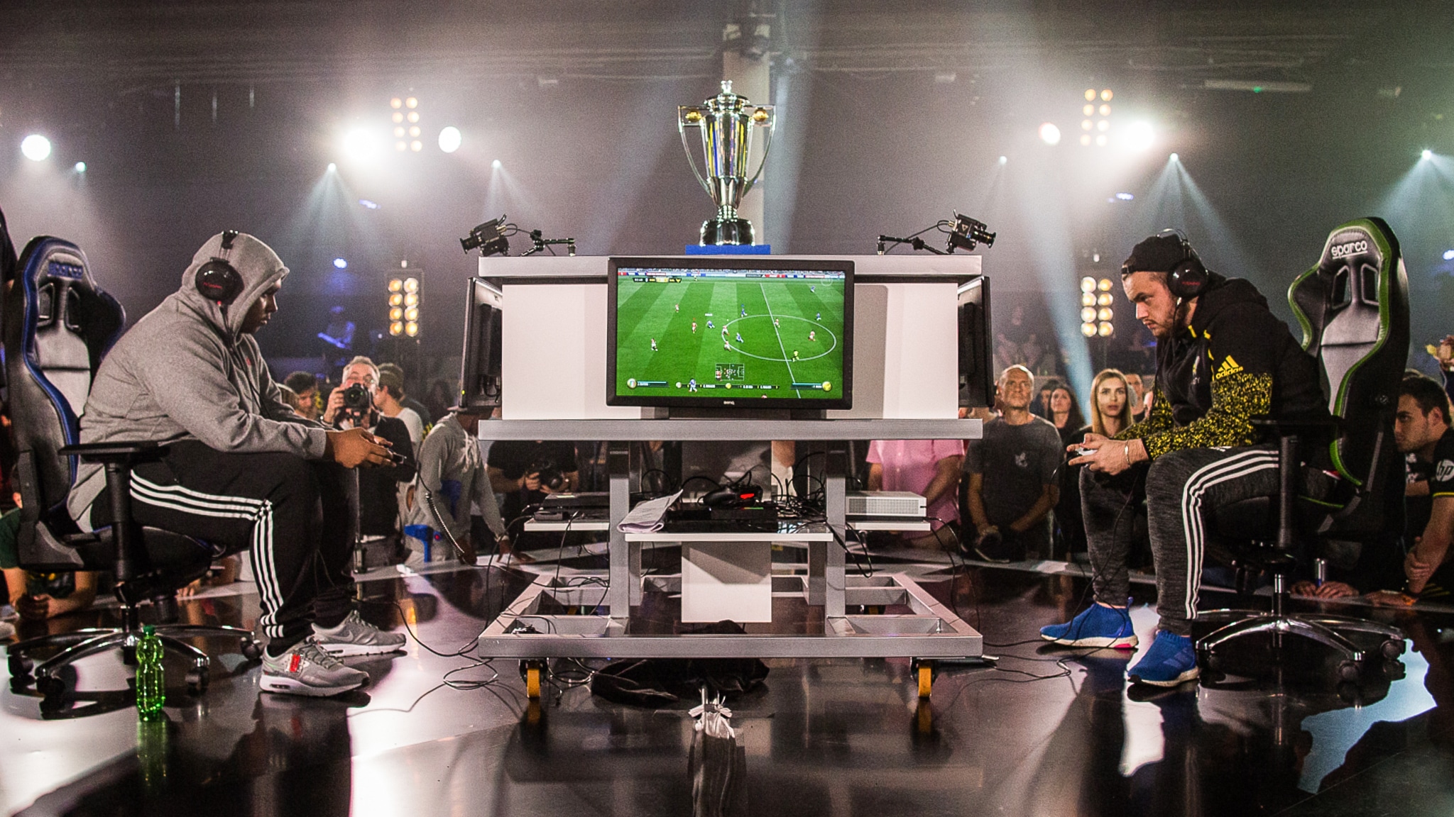 Two gamers face off during EA's FIFA esports tournament