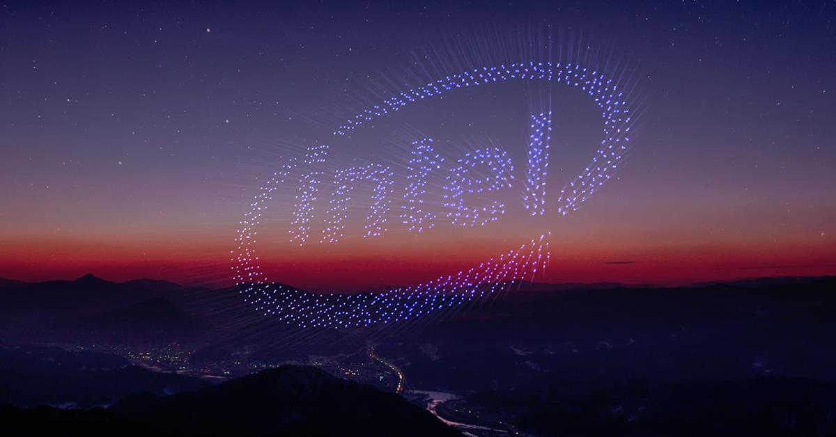 Drones forming Intel insignia in the sky.
