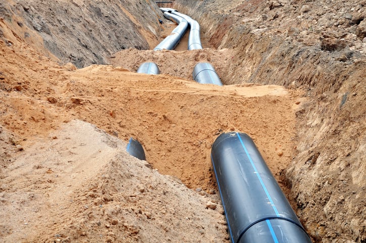 New water lines getting covered with dirt.