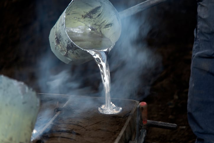 Molten aluminum being poured into a mold.
