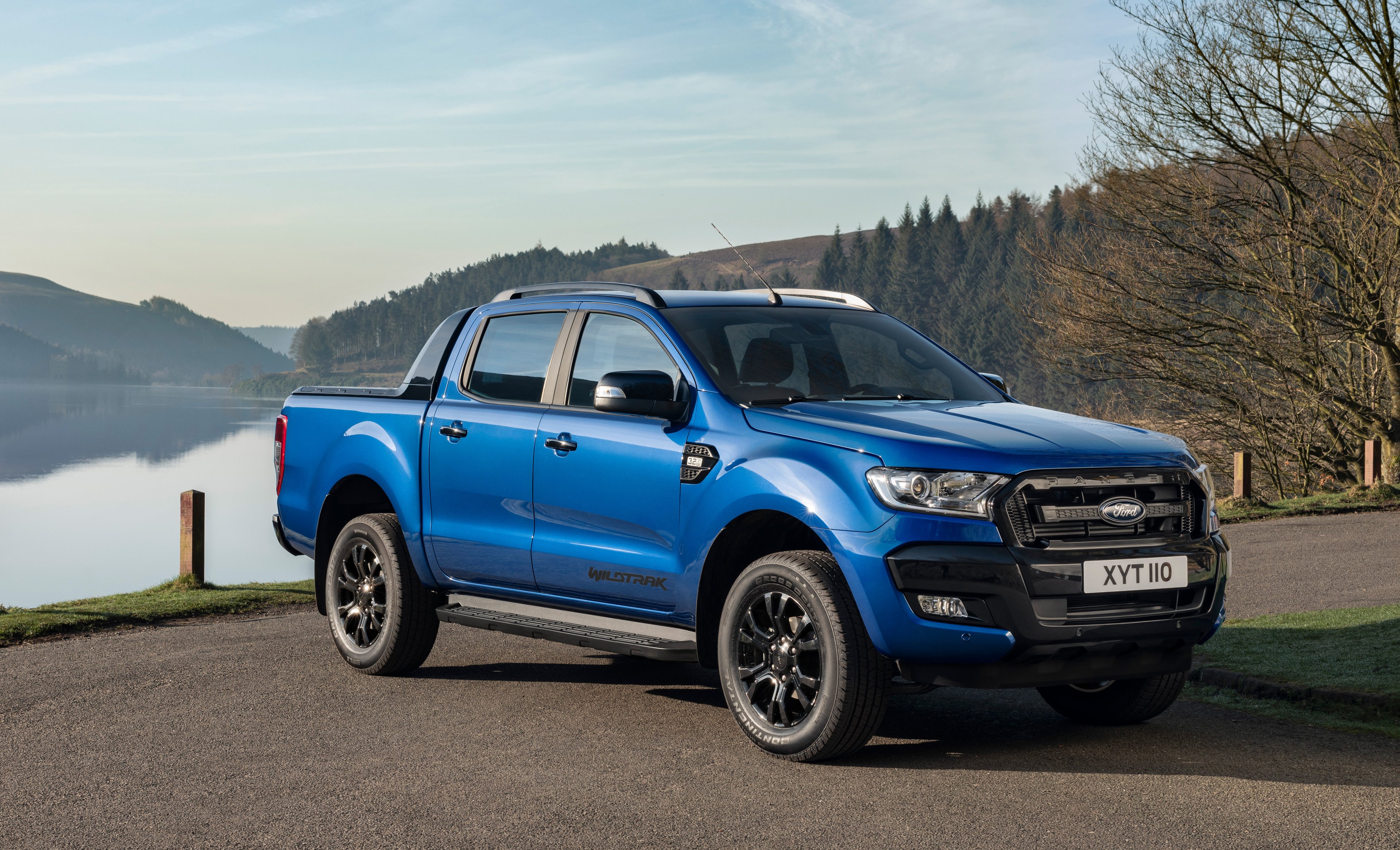 A blue Ford Ranger Wildtrak, a midsize pickup truck optimized for off-road use.