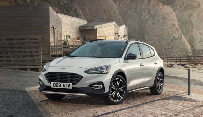 A white 2018 Ford Focus Active with British license plates.