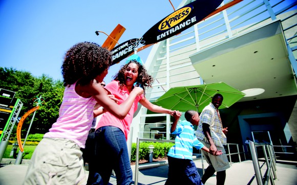 A family entering the Men in Black ride at Universal Studios Florida.
