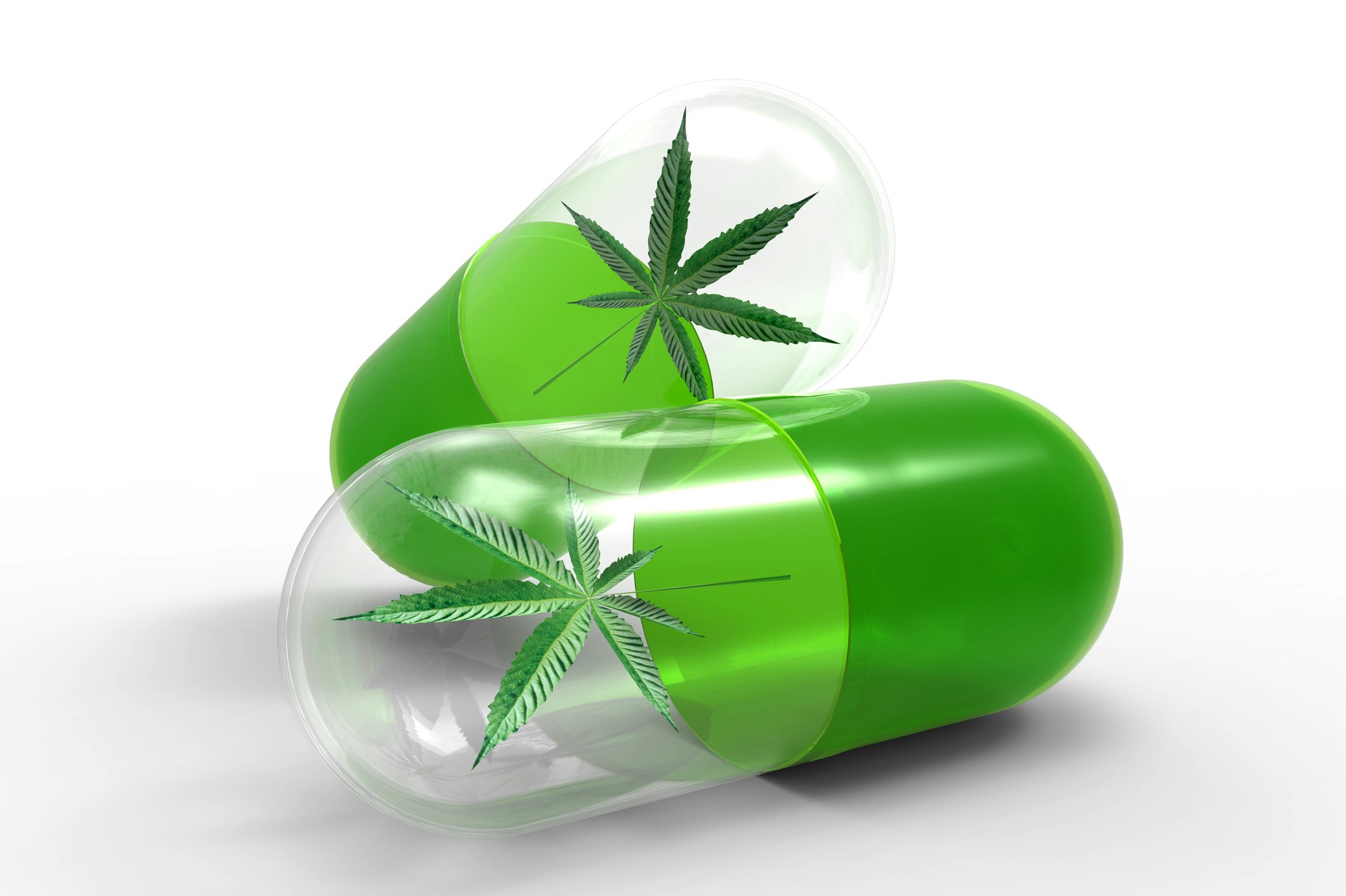 Marijuana leaves inside medical capsules