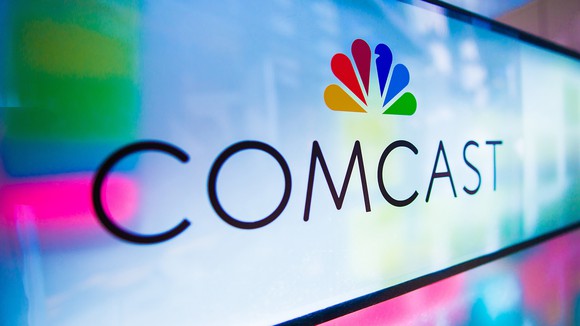 Comcast logo featuring the NBC peacock logo.