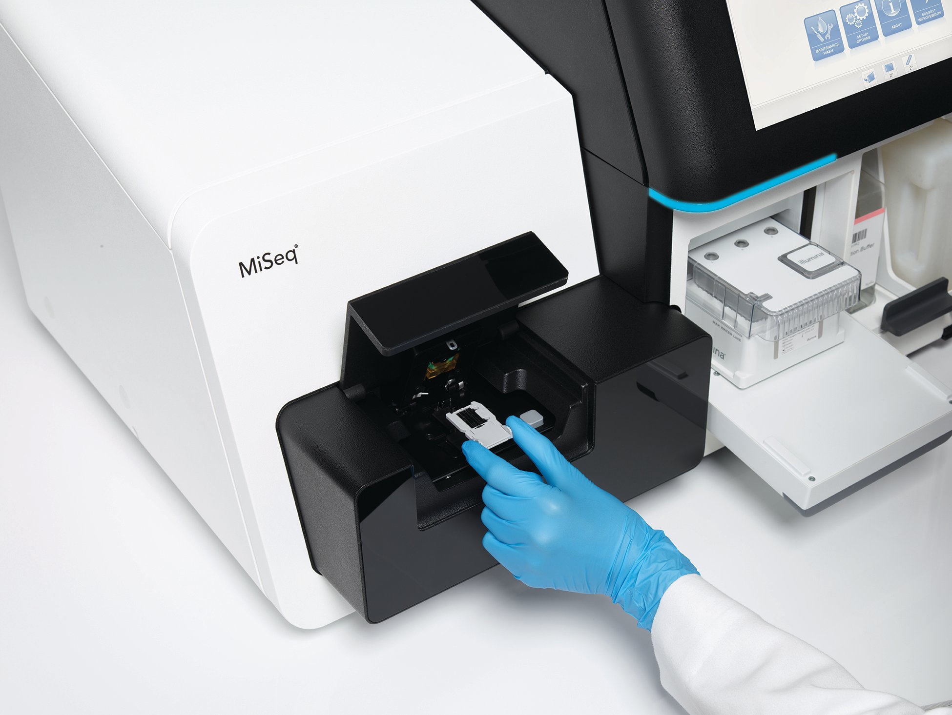 Scientist using a gene sequencer.