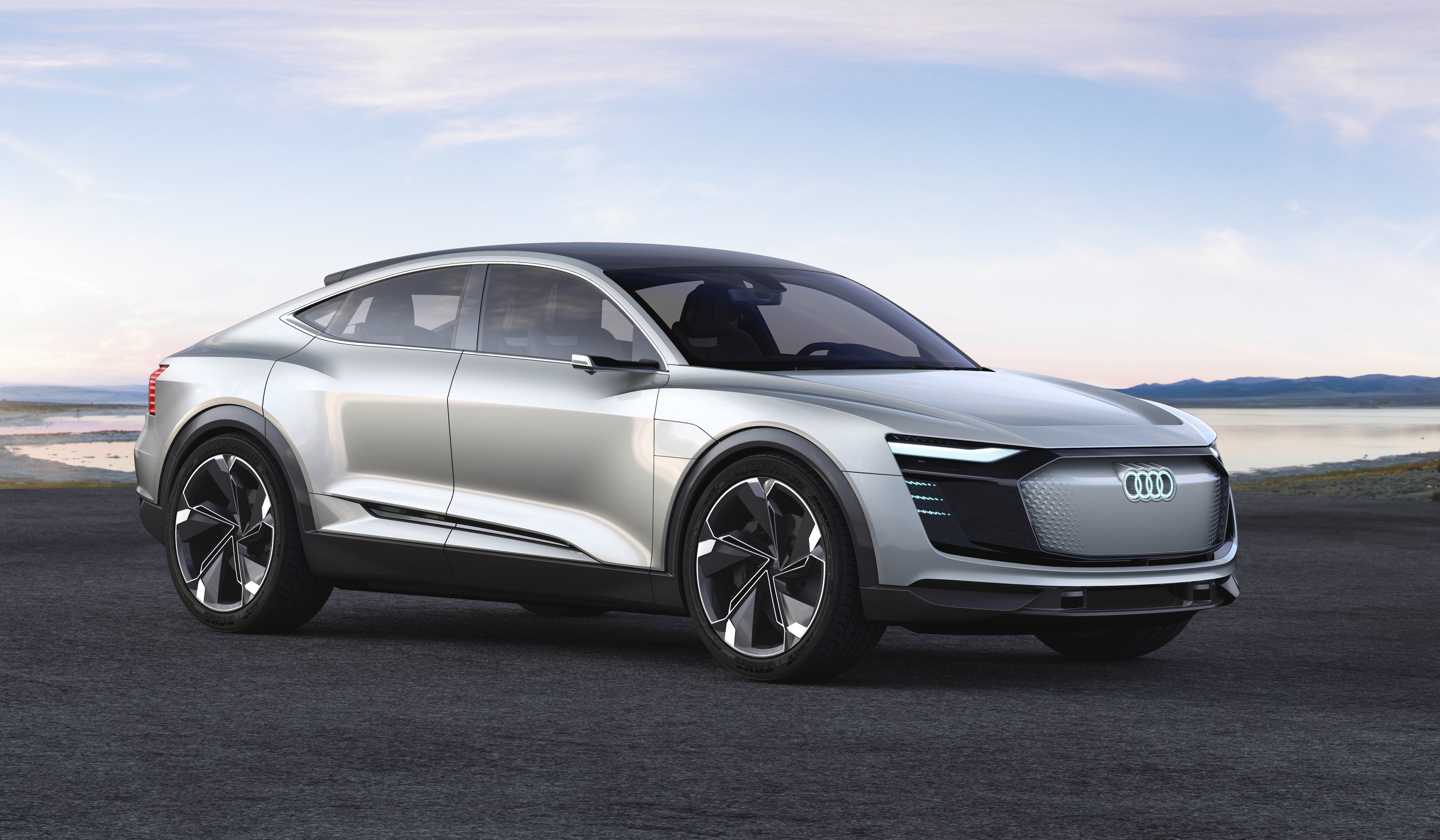 The Audi e-tron Sportback show car, a sedan with a high SUV-like ride and a sleek coupe roofline. 