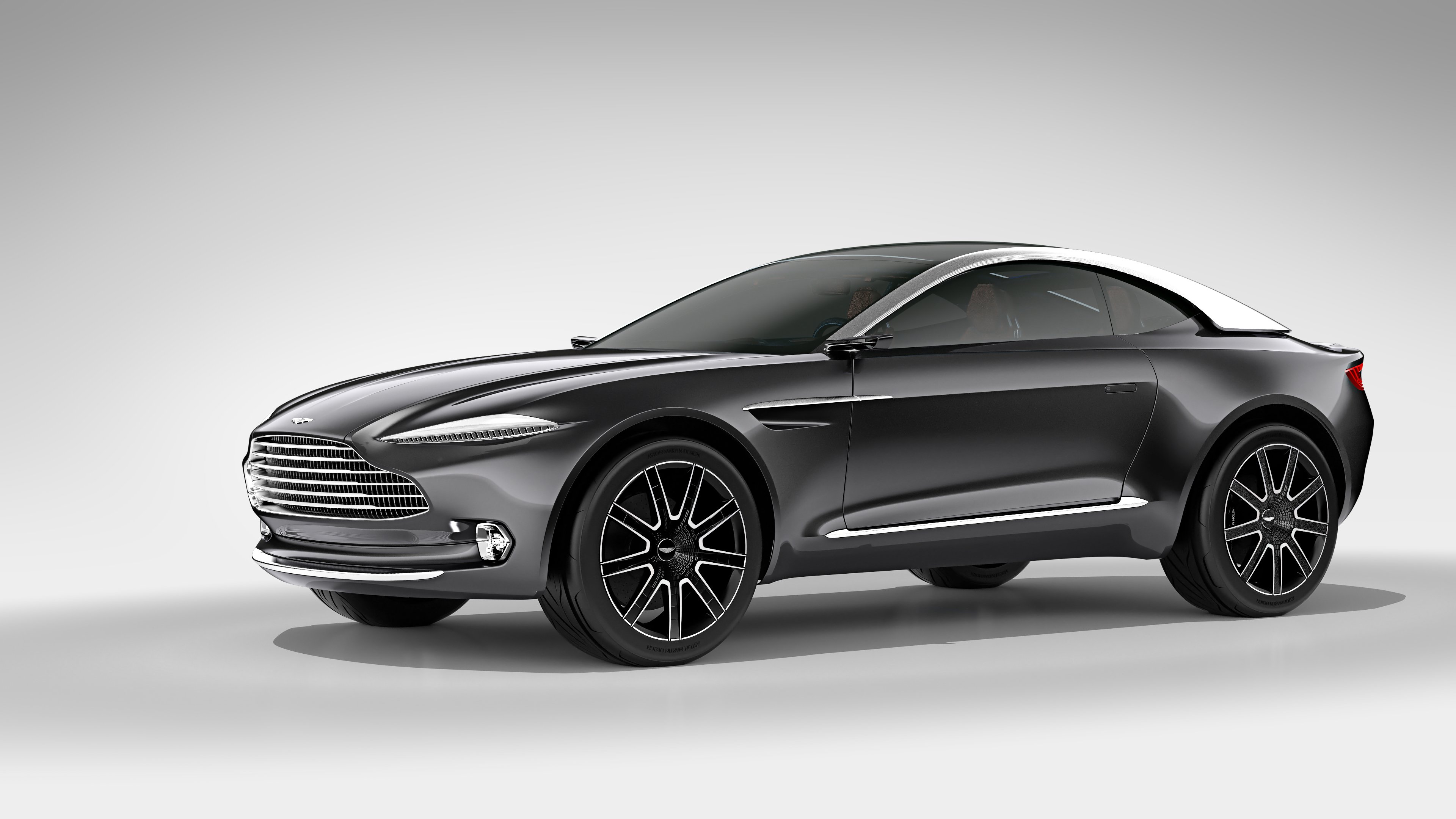The Aston Martin DBX, an SUV with a low, coupe-like roofline. 
