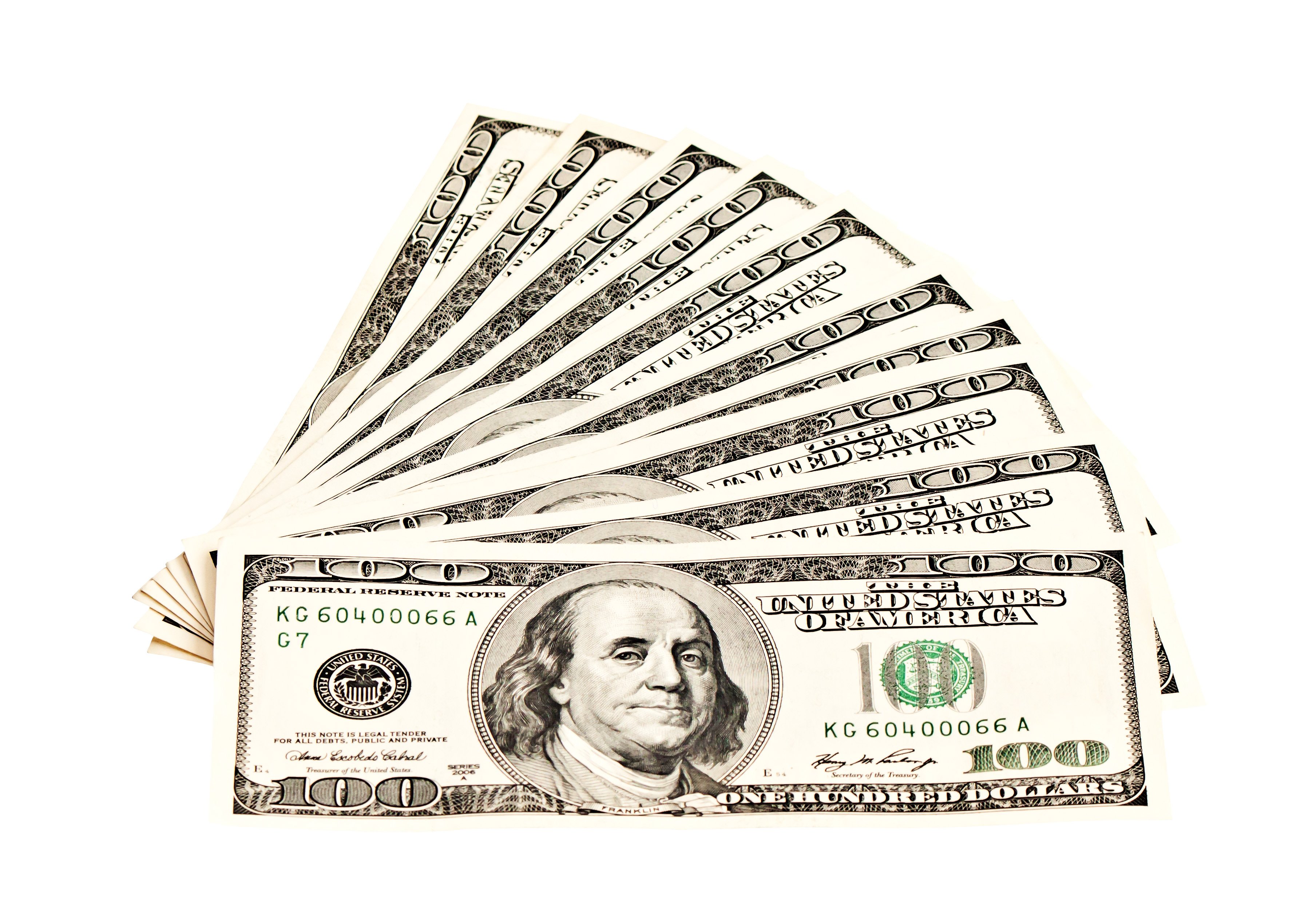 10 $100 bills fanned out.