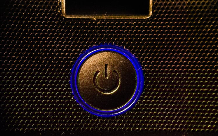 A blue power button.